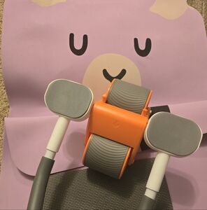 Orange and Gray Ab Roller with Pink Yoga Mat